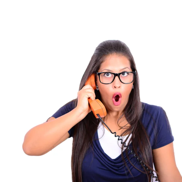 Portrait of young female in shock while talking on phone having — Stock Photo, Image