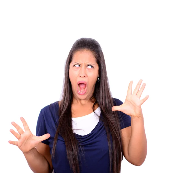 Scared woman with spread hands against white background — Stock Photo, Image