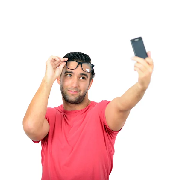 Closeup of young handsome man looking at smartphone and taking s — Stock Photo, Image