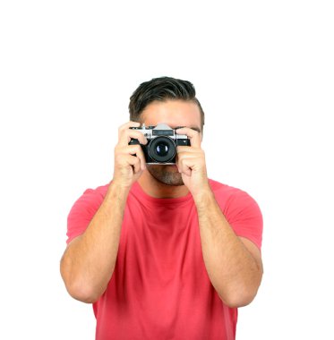 genç adam bir retro kamera-beyaz arka plan ile