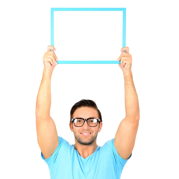 Portrait of a young man showing an empty black billboard on whit — Stock Photo, Image