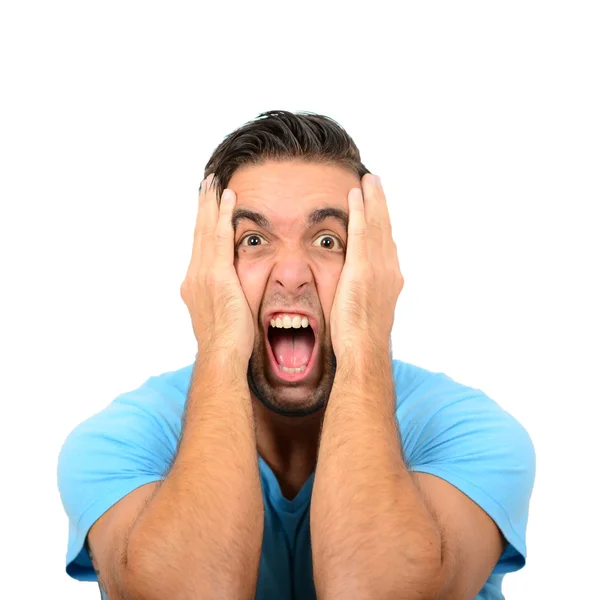 Portrait of angry man screaming and pulling hair against white b — Stock Photo, Image