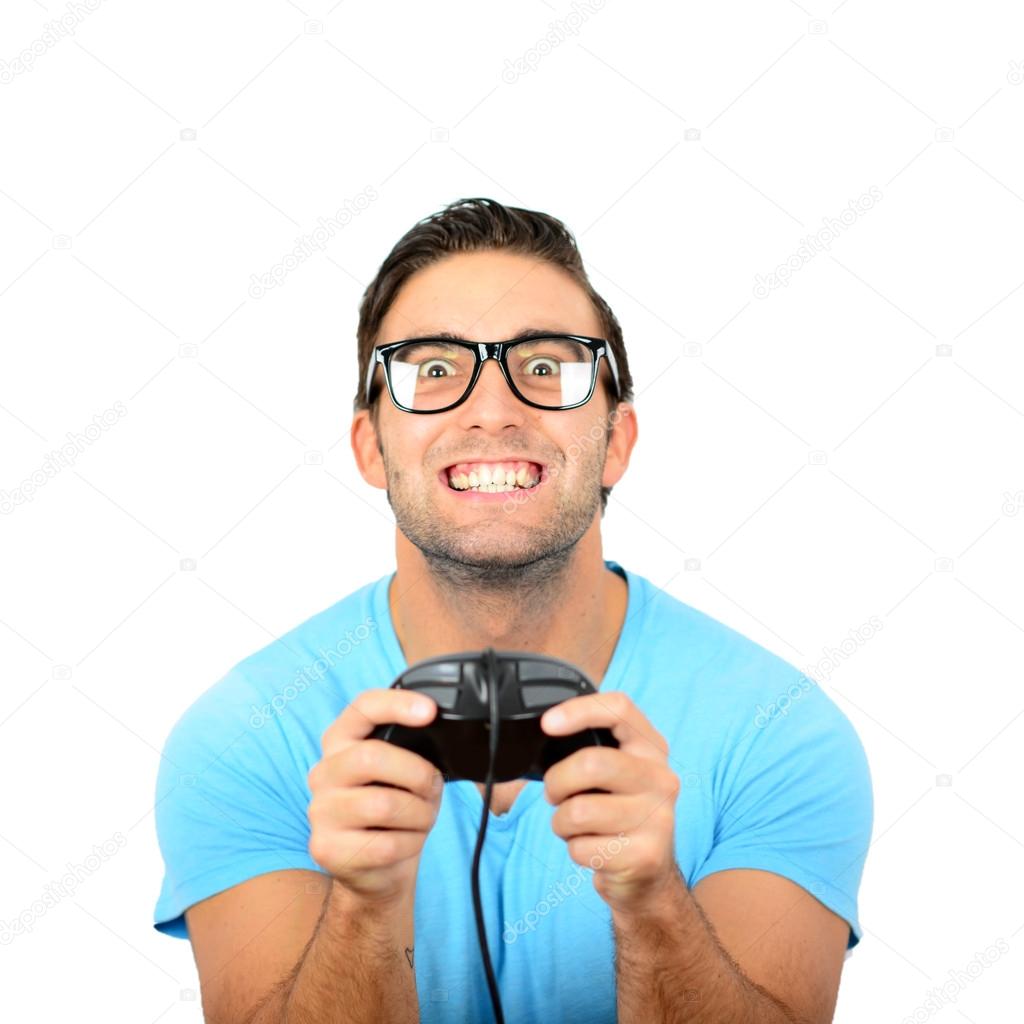 Portrait of handsome man holding joystick for video games agains