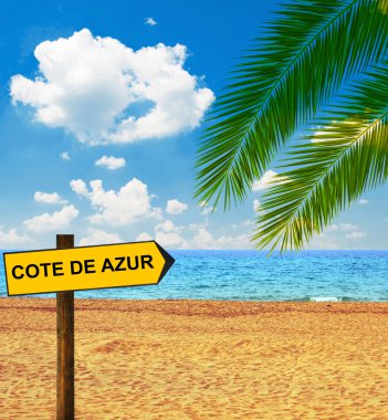 Tropical beach and direction board saying COTE DE AZUR clipart