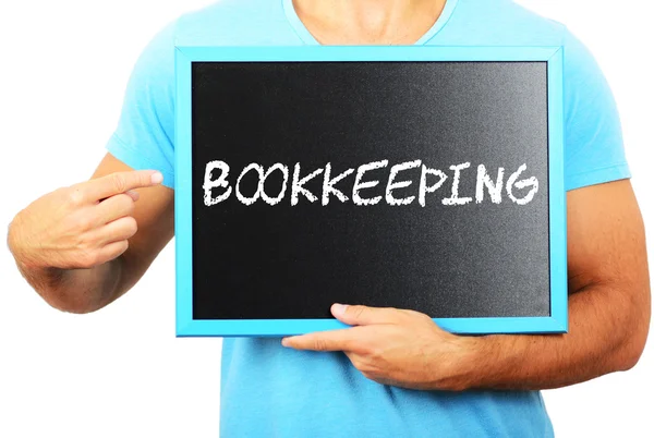 남자 손에 칠판을 가리키는 단어 bookkeepin — 스톡 사진