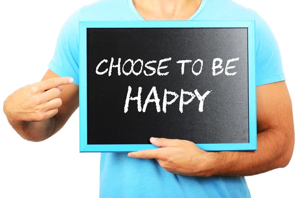 Man holding blackboard in hands and pointing the word CHOOSE TO — Stock Photo, Image