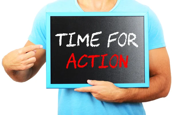 Man holding blackboard in hands and pointing the word — Stock Photo, Image