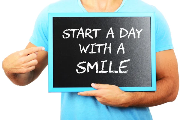 Man holding blackboard in hands and pointing the word START A DA — Stock Photo, Image