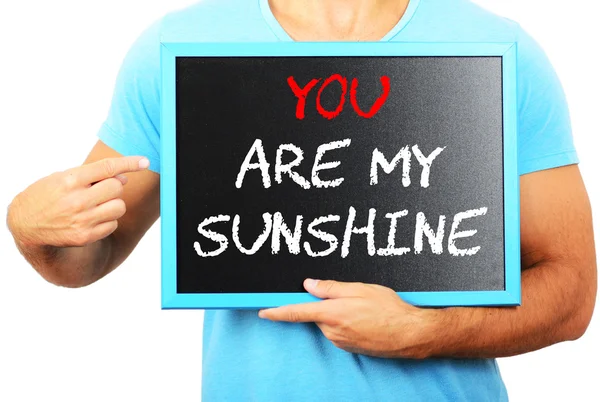 Man holding blackboard in hands and pointing the word YOU ARE MY — Stock Photo, Image