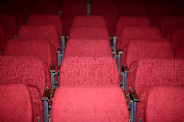 Empty red seats for cinema theater conference or concert — Stock Photo, Image