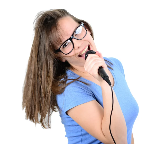 Portrait of a young female with microphone against white backgro — Stock Photo, Image