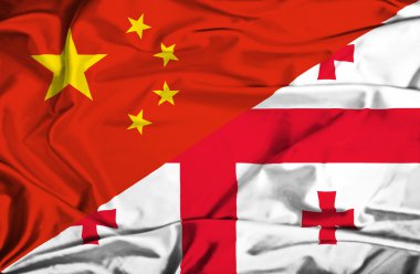 Gürcistan ve Çin bayrağı sallayarak