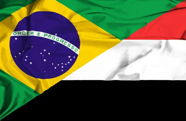 Flagge von Jemen und Brasilien schwenken — Stockfoto