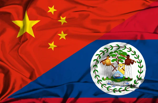 Waving flag of Belize and China — Stock Photo, Image