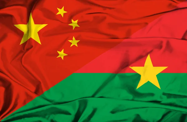 Flagge von Burkina Faso und China schwenken — Stockfoto