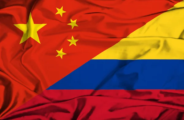 Flagge von Kolumbien und China schwenken — Stockfoto