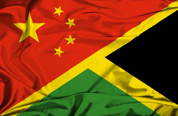 Sventolando bandiera della Giamaica e della Cina — Foto Stock