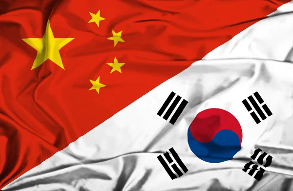 Waving flag of South Korea and China — Stock Photo, Image