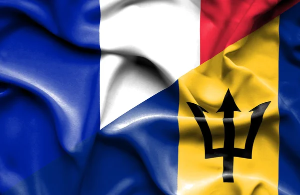 Waving flag of Barbados and France — Stock Photo, Image