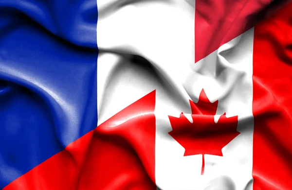 Bandeira ondulada do Canadá e da França — Fotografia de Stock