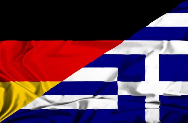 Yunanistan ve Almanya bayrağı sallayarak