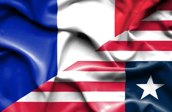 Flagge von Liberia und Frankreich schwenken — Stockfoto