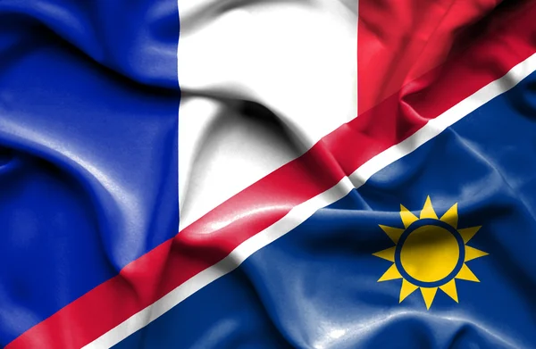 Waving flag of Namibia and France — Stock Photo, Image