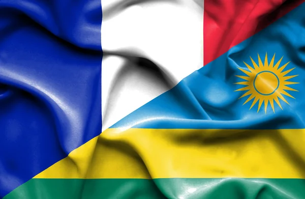 Wapperende vlag van Rwanda en Frankrijk — Stockfoto