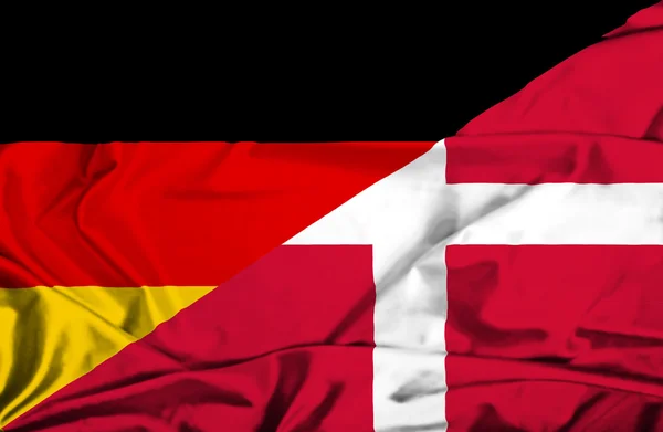 Dánia és Németország hullámzó zászlaja — Stock Fotó
