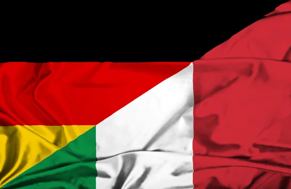 Italien och Tyskland viftande flagga — Stockfoto
