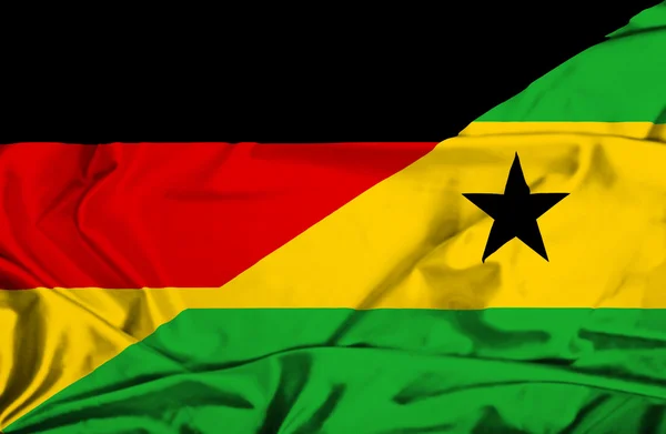 Sao Tomé és Príncipe és Németország hullámzó zászlaja — Stock Fotó