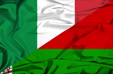 Beyaz Rusya ve İtalya bayrağı sallayarak