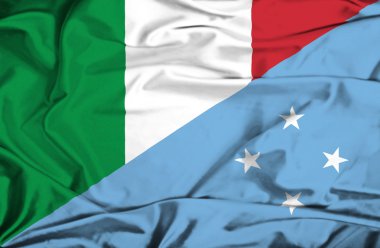 Mikronezya ve İtalya bayrağı sallayarak