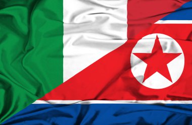 Kuzey Kore ve İtalya bayrağı sallayarak