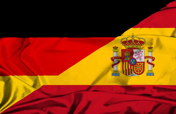 Mávání vlajkou Španělska a Německa — Stock fotografie