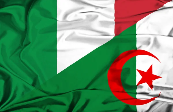 Waving flag of Algeria and Italy — Stock Photo, Image