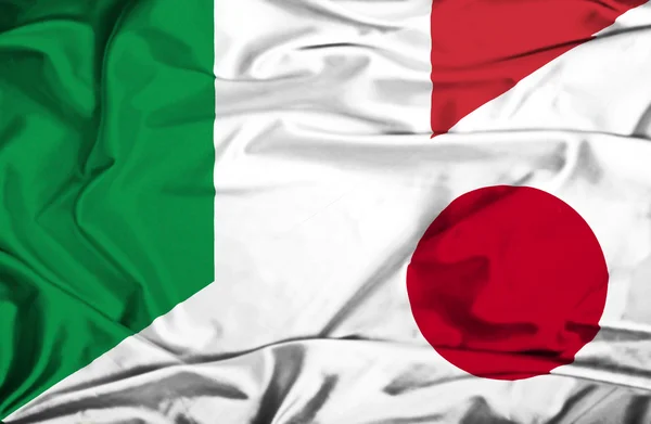 Wapperende vlag van Japan en Italië — Stockfoto