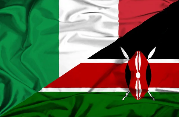 Kenya ve İtalya bayrağı sallayarak — Stok fotoğraf