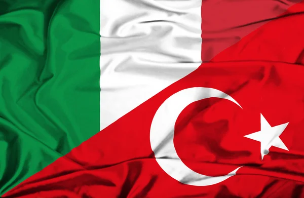 Waving flag of Turkey and Italy — Stock Photo, Image