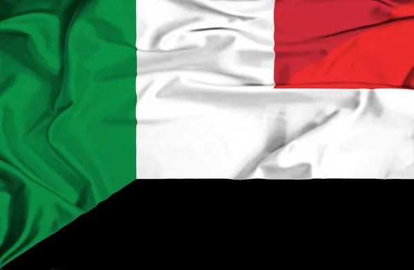 Flagge von Jemen und Italien schwenken — Stockfoto