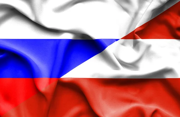 Waving flag of Austria and Russia — Stock Photo, Image