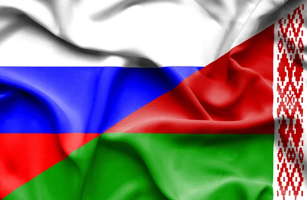 Ondeando bandera de Bielorrusia y Rusia — Foto de Stock