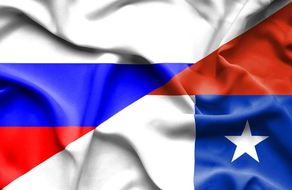 智利和俄罗斯那飘扬的旗帜 — 图库照片