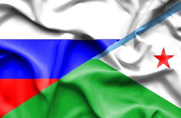 Wapperende vlag van dijbouti en Rusland — Stockfoto