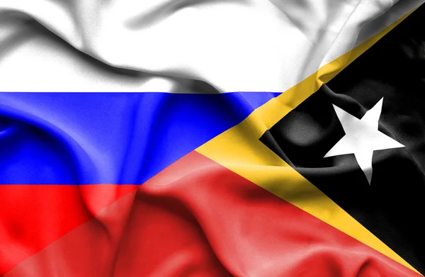 Wapperende vlag van Oost-timor en Rusland — Stockfoto