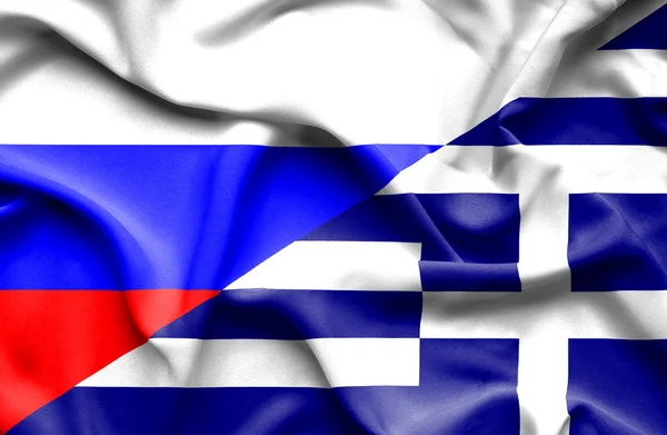 Yunanistan ve Rusya bayrağı sallayarak — Stok fotoğraf