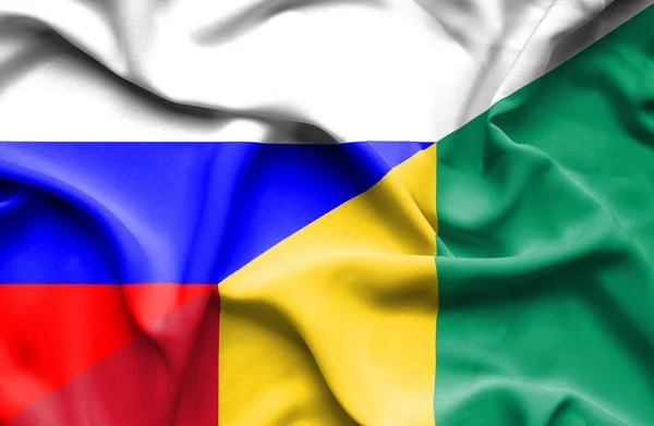 Flagge von Guinea und Russland schwenken — Stockfoto
