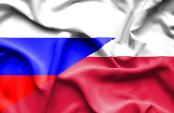 Waving flag of Poland and  Russia — Stock Photo, Image