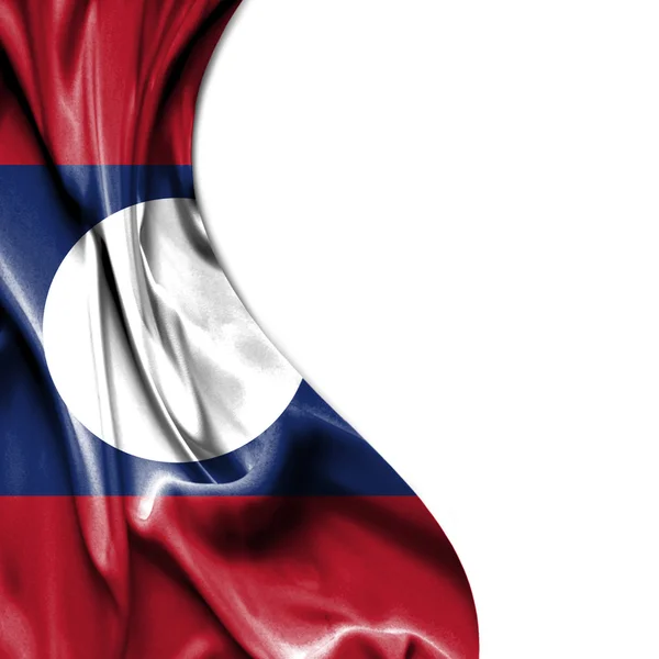 Лаос размахивая атласным флагом на белом фоне — стоковое фото