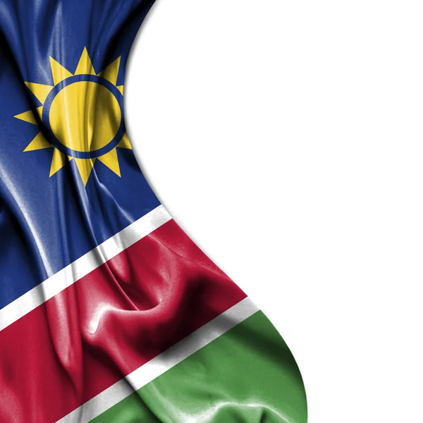 Namibië zwaaien satijn vlag geïsoleerd op witte achtergrond — Stockfoto